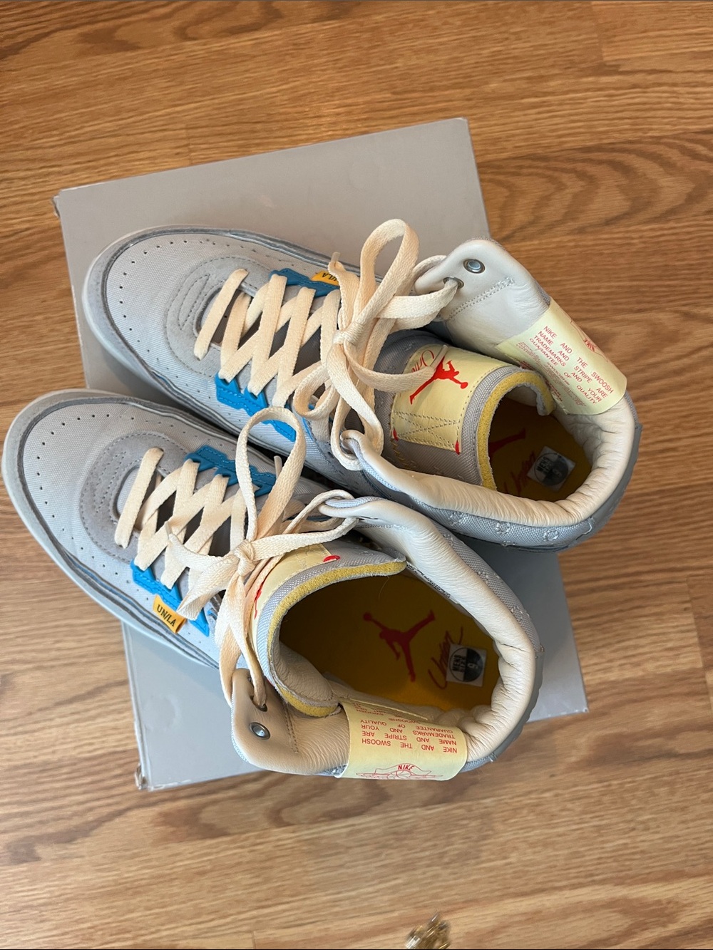 Men’s or Women Jordan Grey and Blue High-Top Sneakers with Yellow Accents